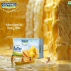 Govind butter packaging with a miniature scene of people in a boat and children playing in water, set against a background of butter blocks.